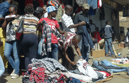 A vendor selling some used clothing