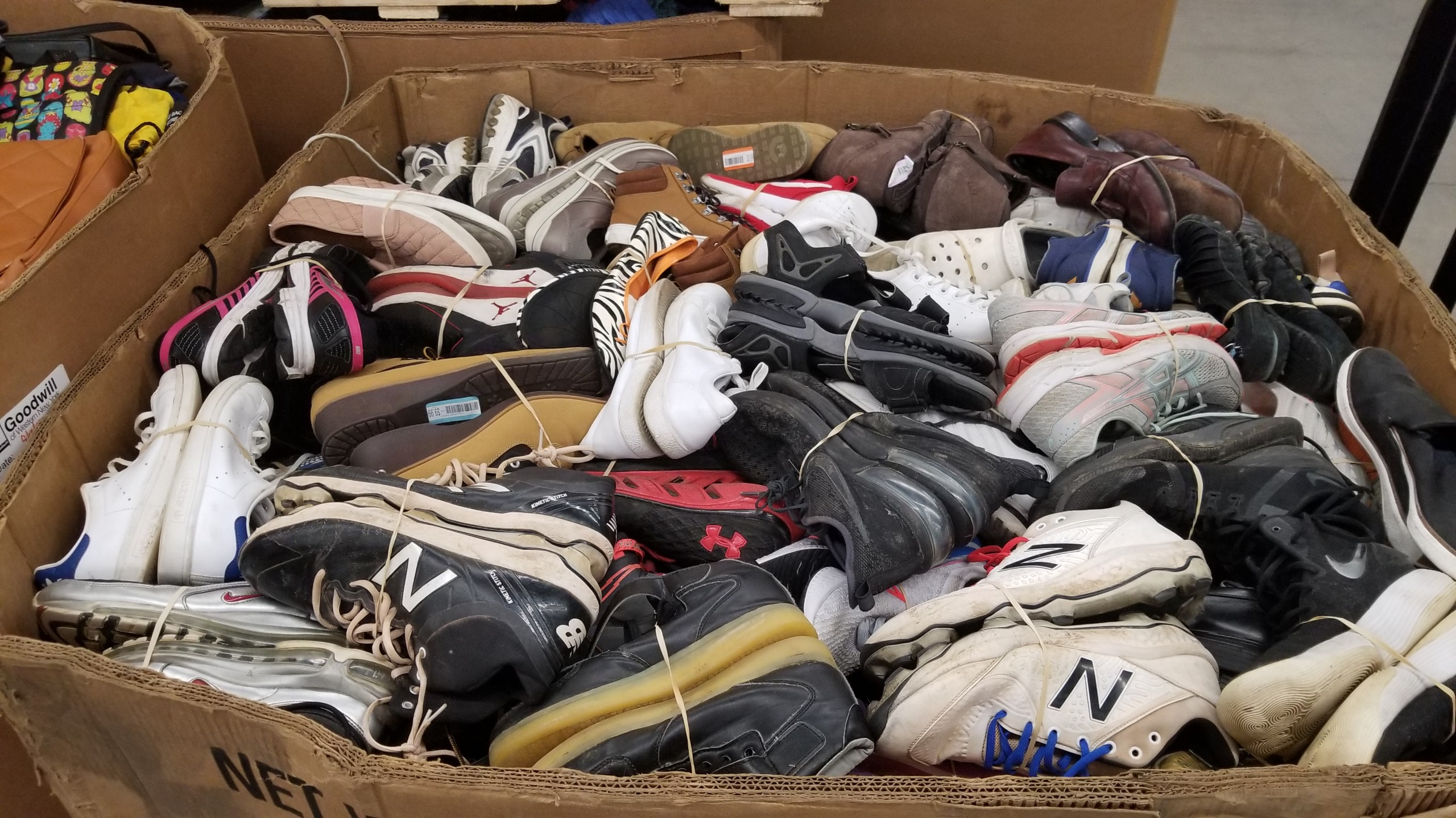 Used shoes paired and in a box